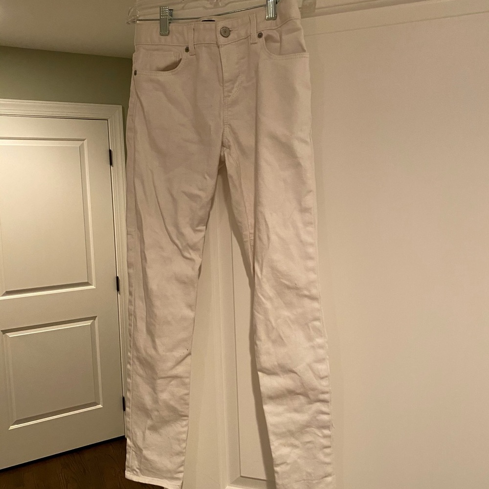 Girls’ white jeans. Size 14.